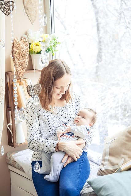 Mother holding her newborn baby